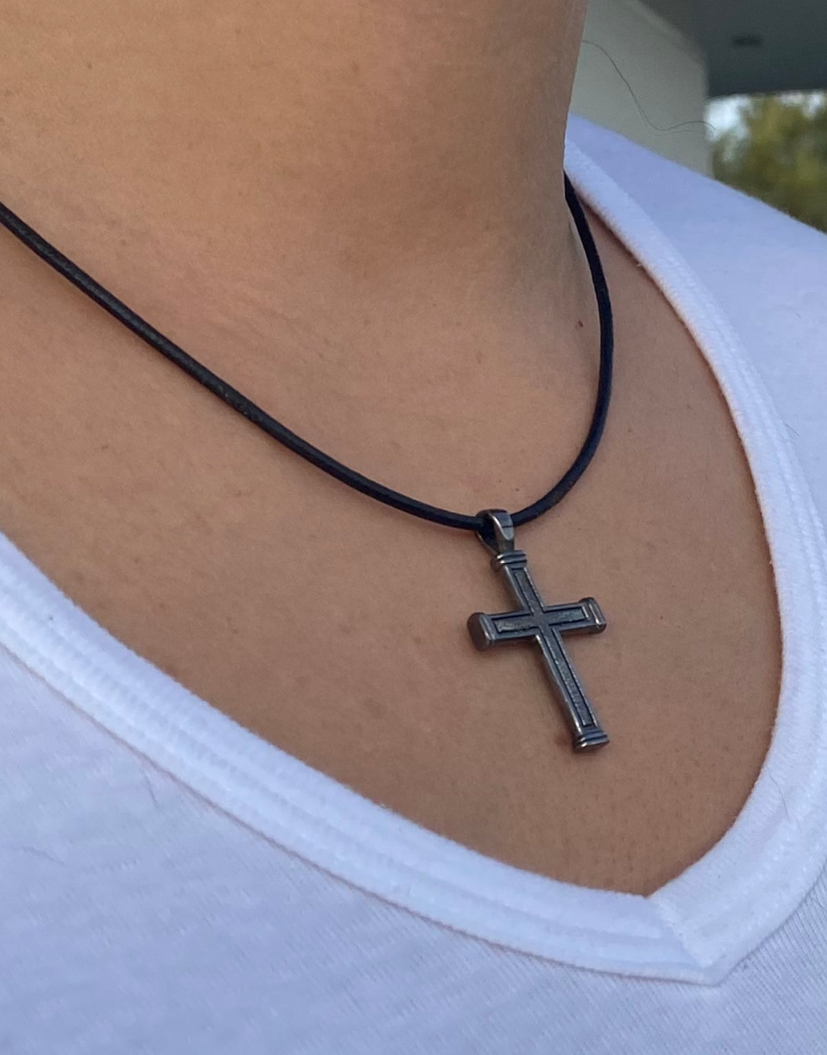 Men's black cross necklace with leather cord