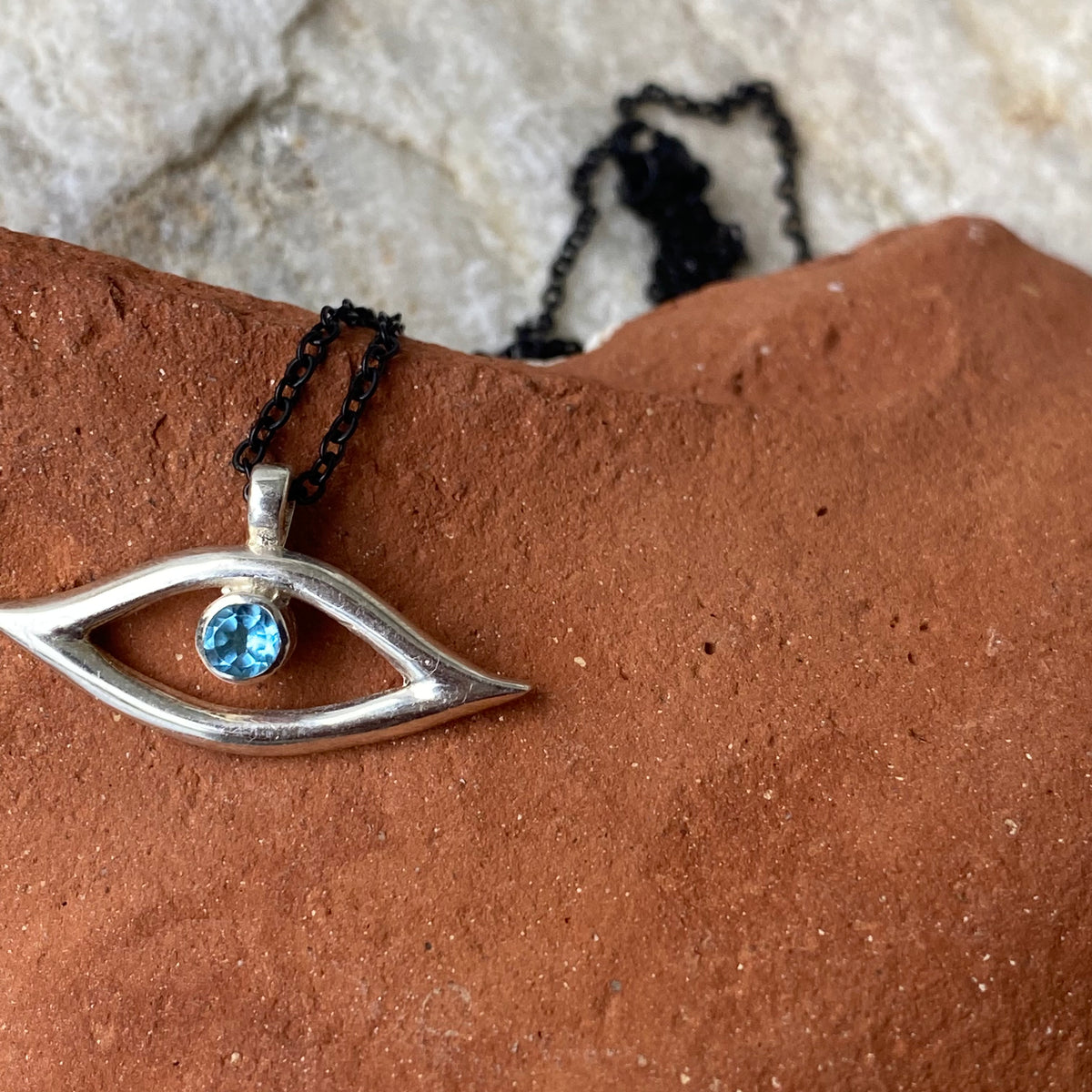 Evil eye necklace blue gem and black stainless steel chain