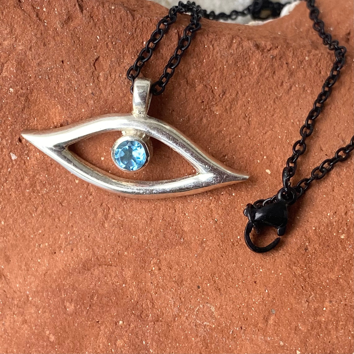 Evil eye necklace blue gem and black stainless steel chain