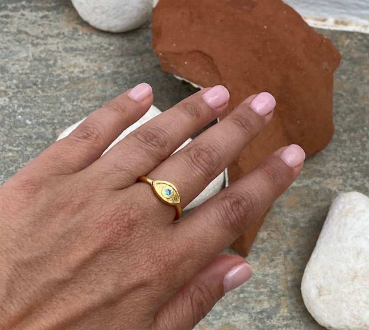 evils eye ring gold with blue gemstone