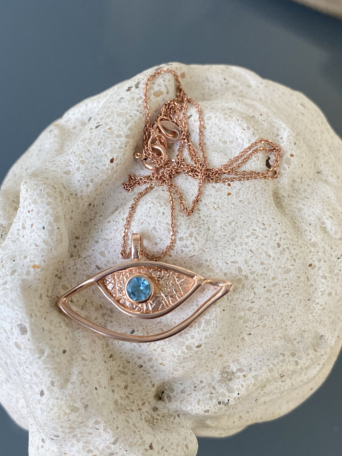 rose gold evil eye necklace with blue gemstone handmade