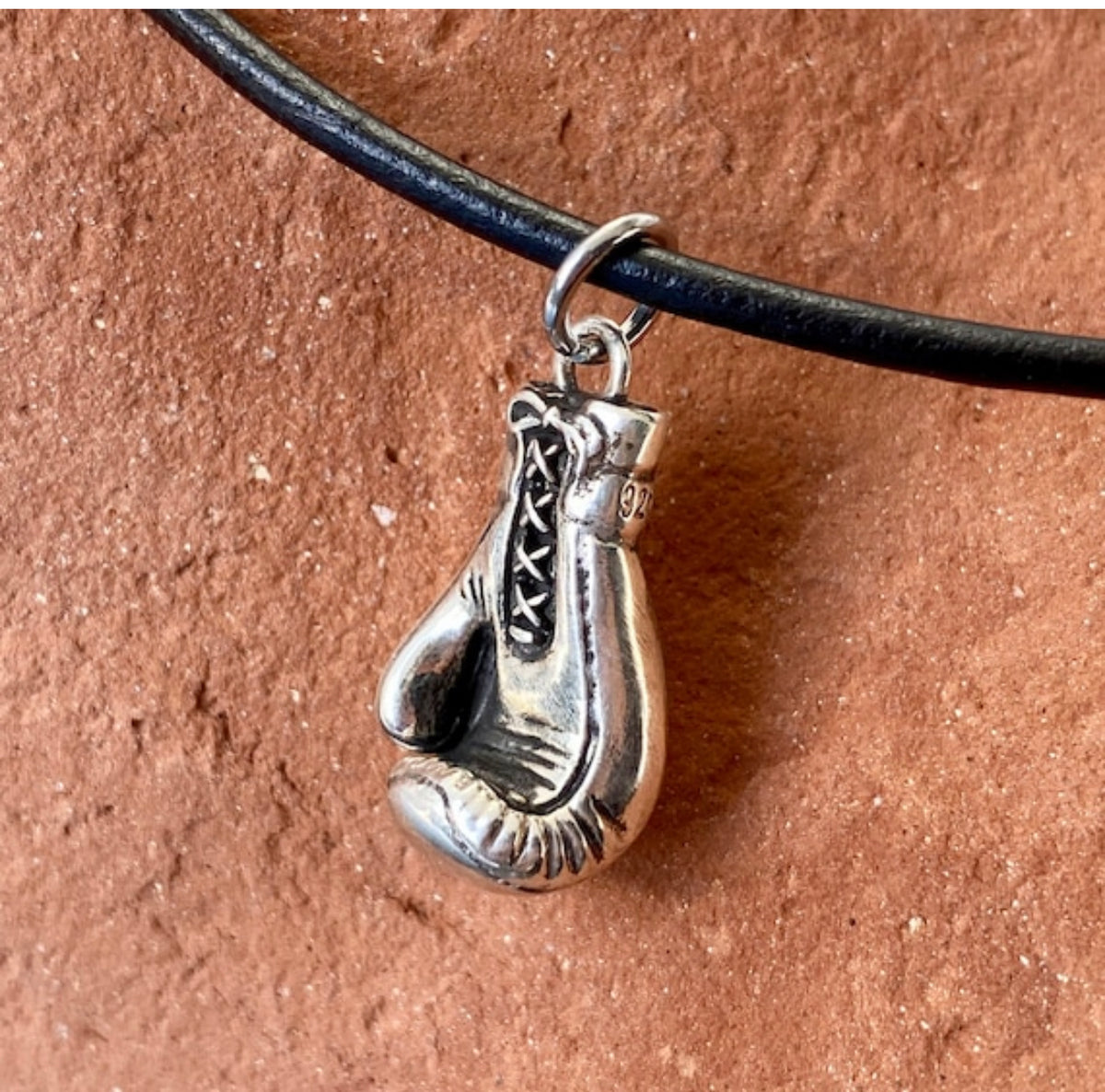 silver boxing glove with paperclip chain