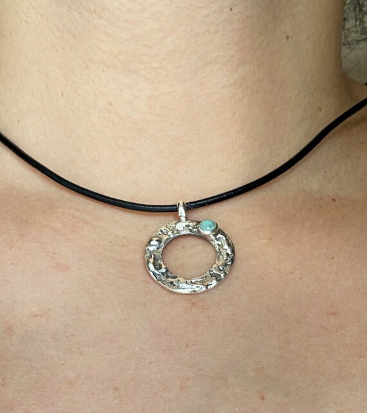 handmade circle necklace with a turquoise gemstone