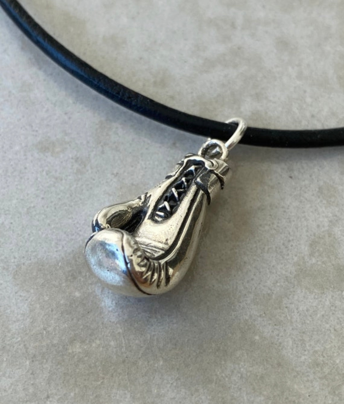 silver boxing glove with paperclip chain