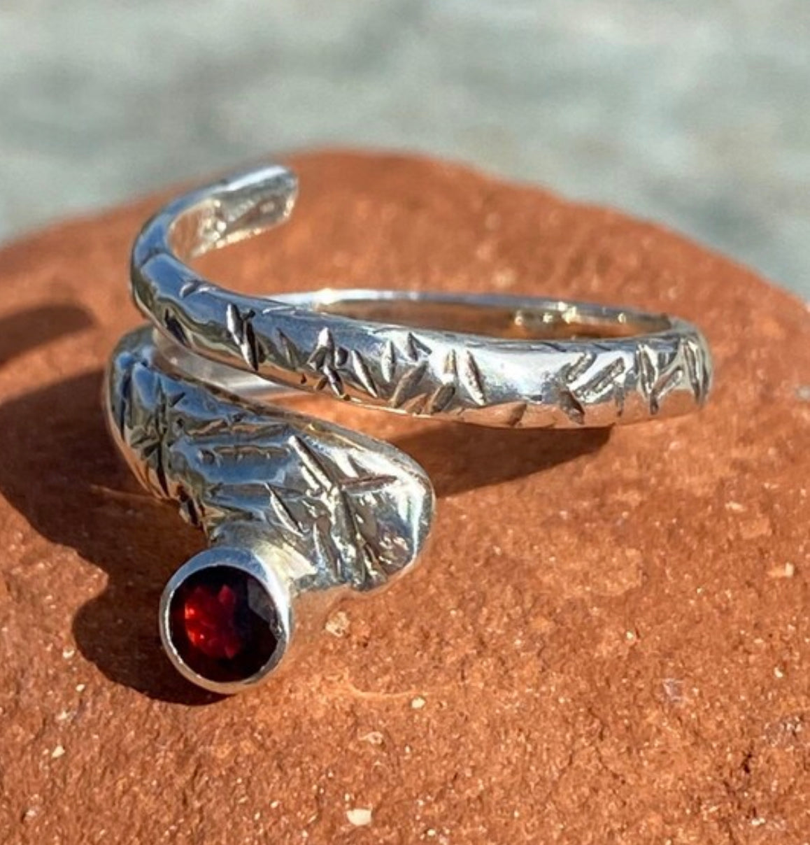 silver spiral ring, garnet ring, January birthstone ring
