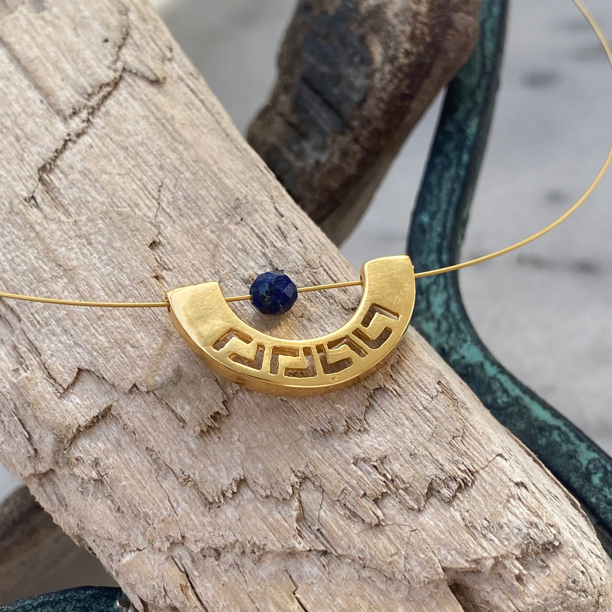 greek key choker necklace gold with a blue lapis