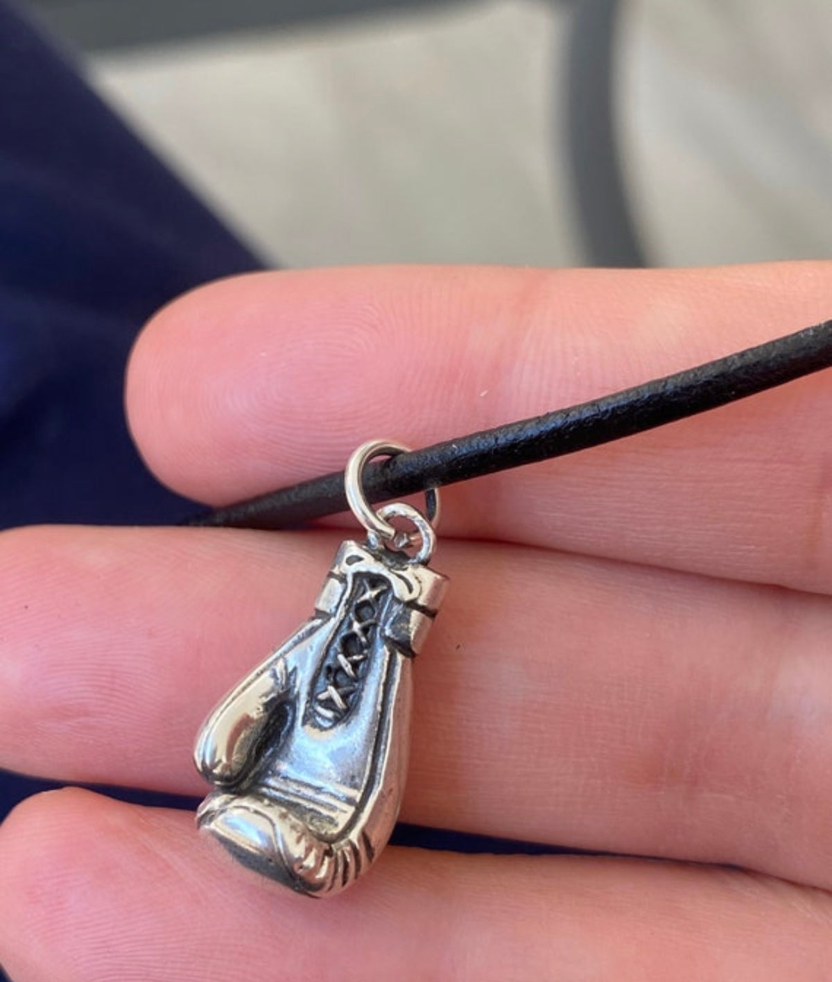silver boxing glove with paperclip chain