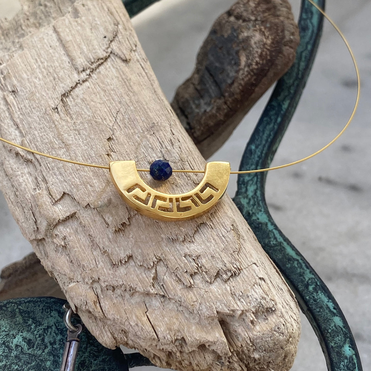 greek key choker necklace gold with a blue lapis