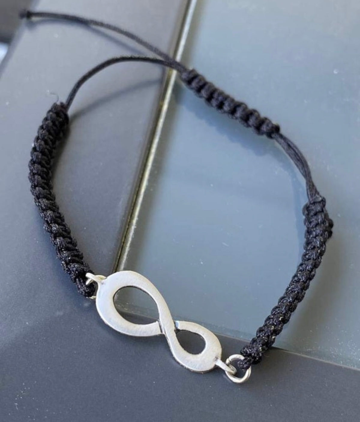 infinity bracelet silver with black macrame