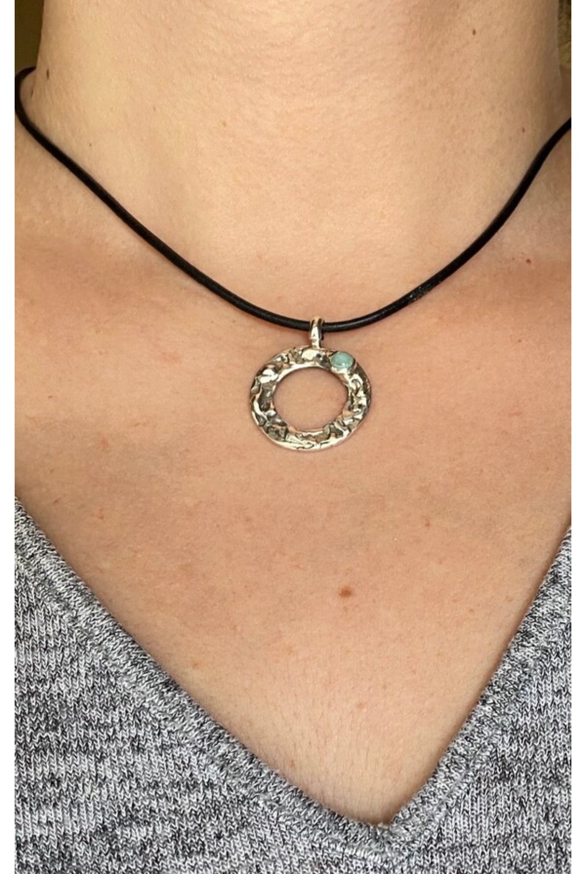 handmade circle necklace with a turquoise gemstone