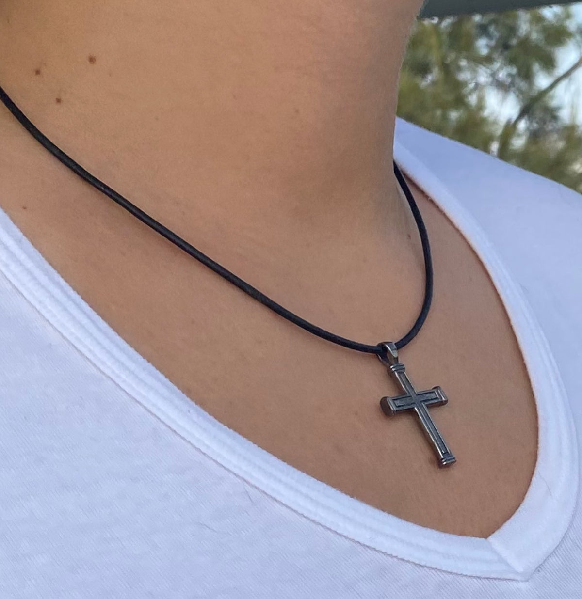 Men's black cross necklace with leather cord