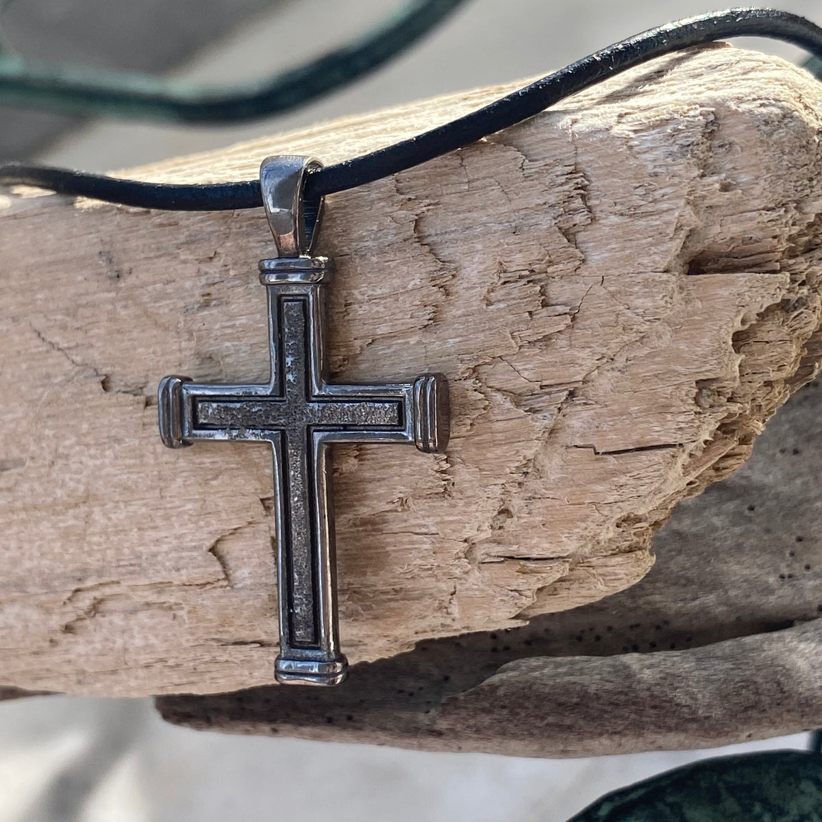 Men's black cross necklace with leather cord
