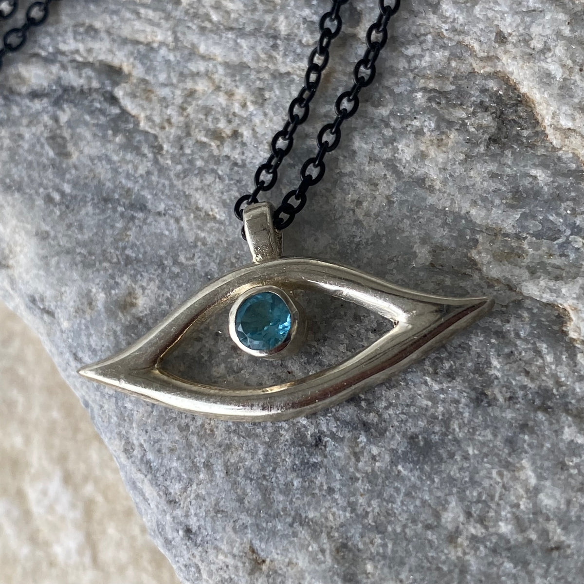 Evil eye necklace blue gem and black stainless steel chain