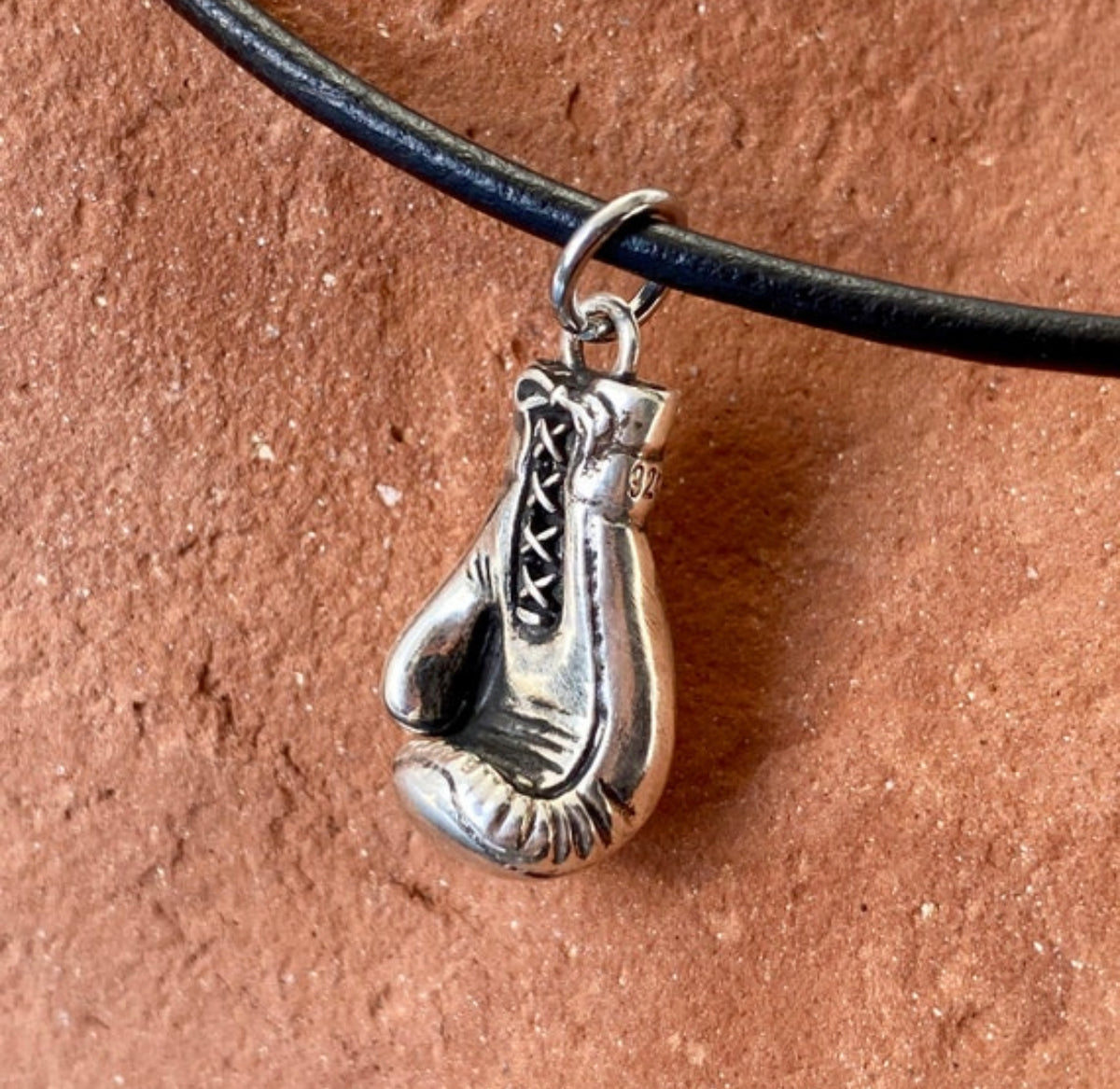silver boxing glove with paperclip chain