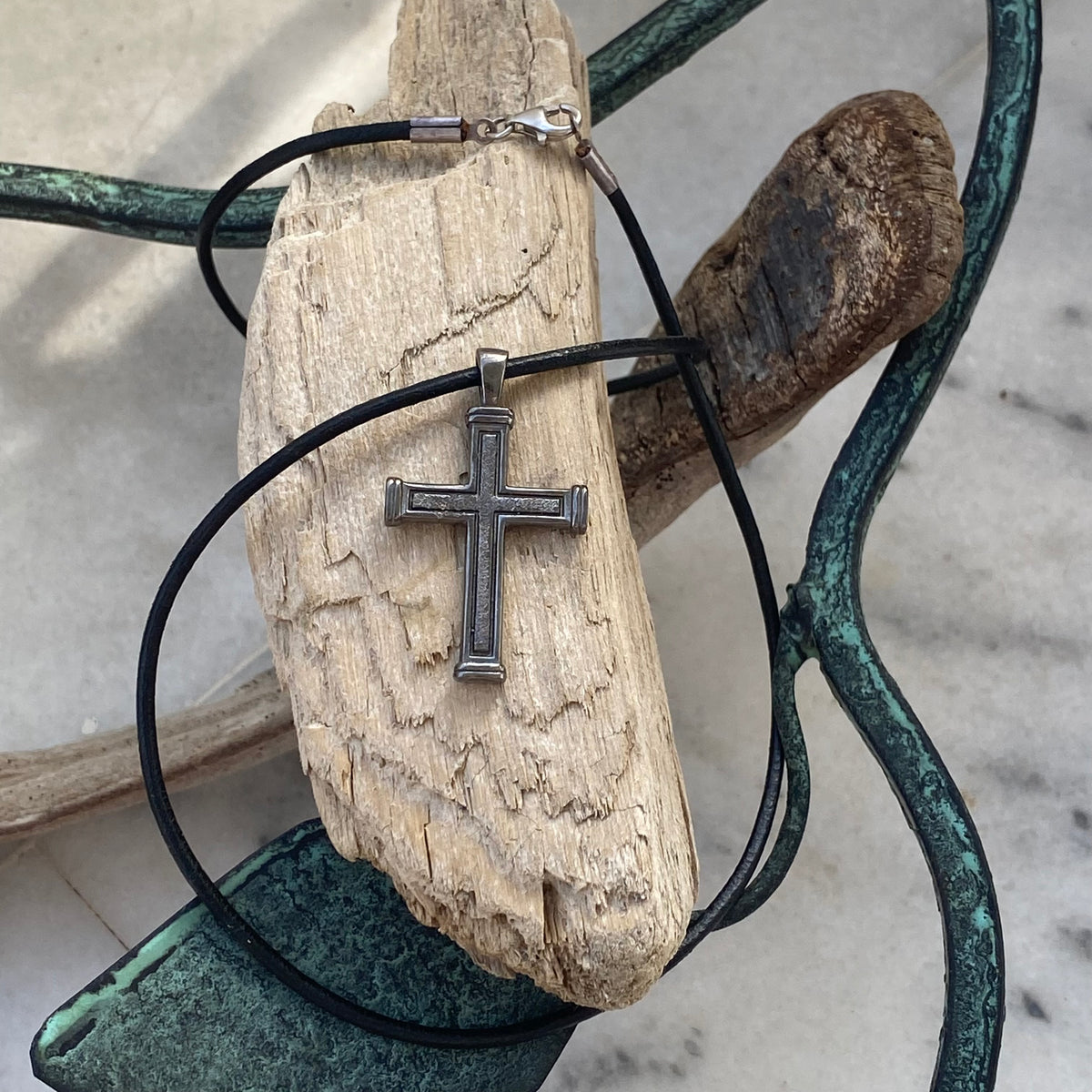 Men's black cross necklace with leather cord