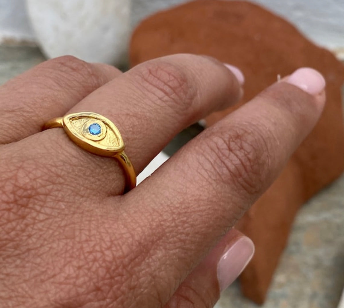 evils eye ring gold with blue gemstone