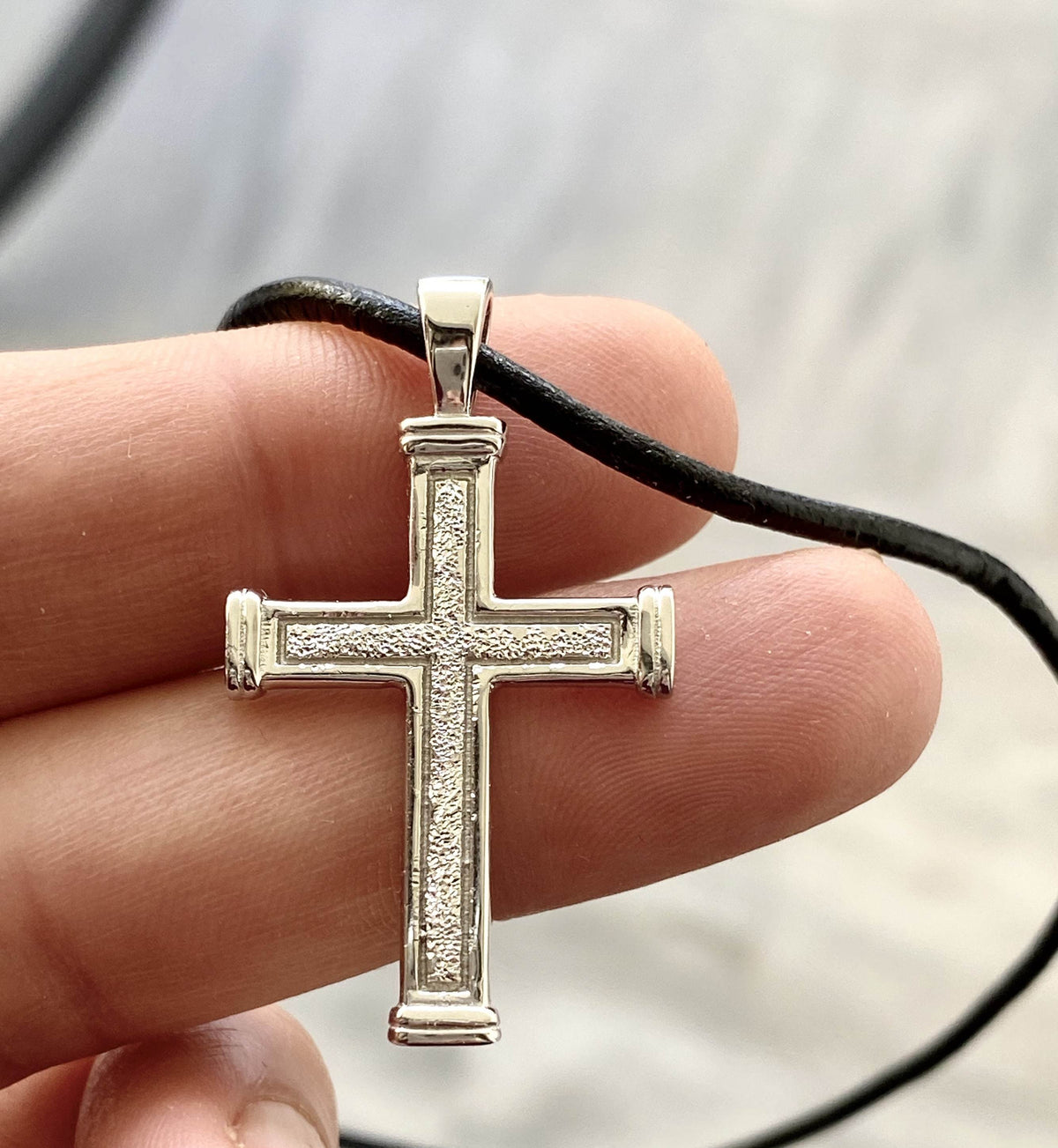 Men's cross necklace with leather cord, white rhodium plated sterling silver cross 